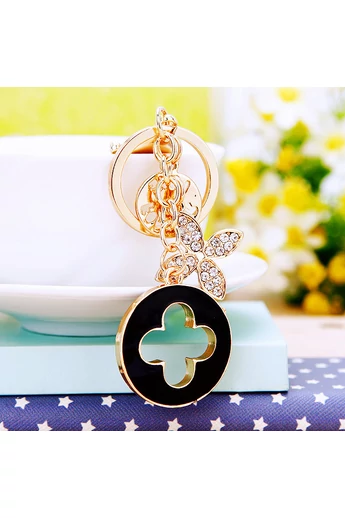 Elegancki czarny brelok Bonluo z wisiorkiem w kształcie kwiatu i wyciętym okręgiem w kształcie koniczyny