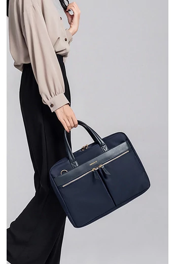  Torba na laptopa Bonluo w kolorze ciemnoniebieskim, wykonana z wodoodpornego poliestru, wymiary: 30*40,5*10 cm